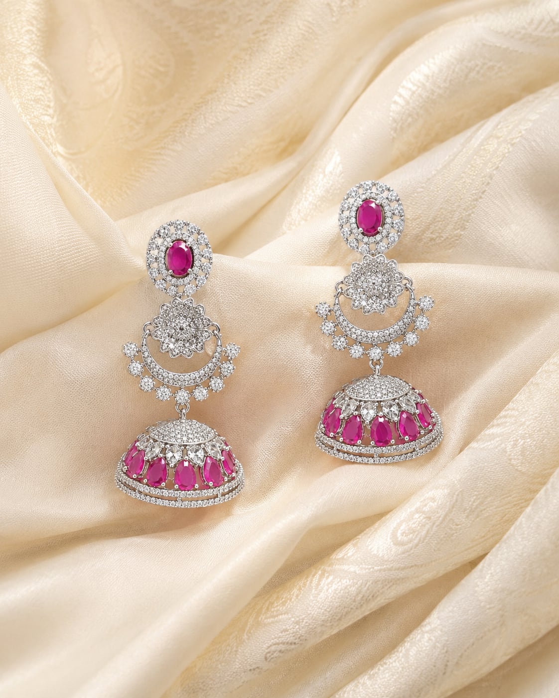 FeelOri Pink Silver Rhodium CZ Three Tier Pearl Look Jhumka Earrings - silk styling view
