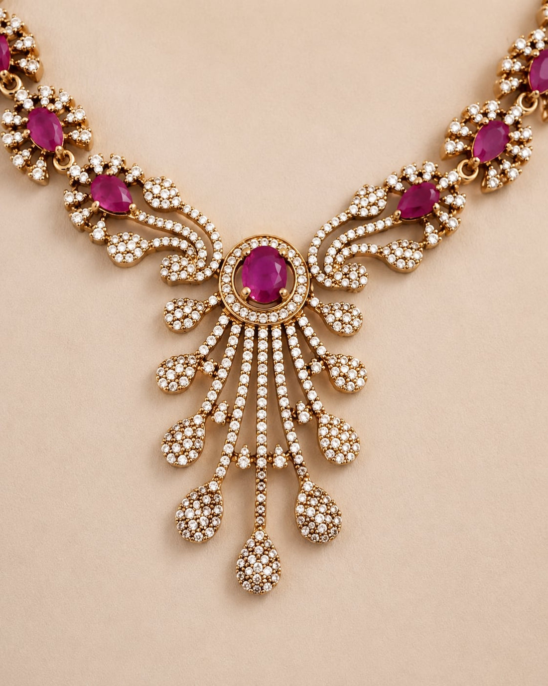 FeelOri ruby-tone necklace set with matching earrings pendant and gold-polished detail