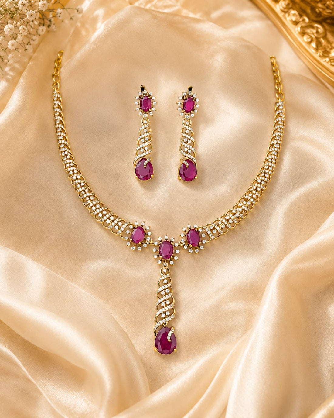 FeelOri ruby-tone necklace set with matching earrings styled with saree fabric for Indian occasion wear