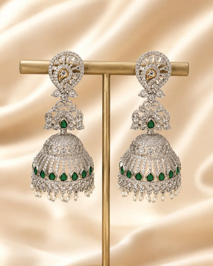 FeelOri silver-tone rhodium-finish emerald-fringe CZ jhumka earrings displayed as a matching pair