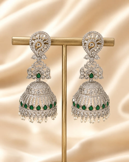 FeelOri silver-tone rhodium-finish emerald-fringe CZ jhumka earrings displayed as a matching pair