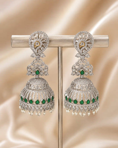 Front view of one matching pair of FeelOri silver-tone rhodium-finish emerald-fringe CZ jhumka earrings