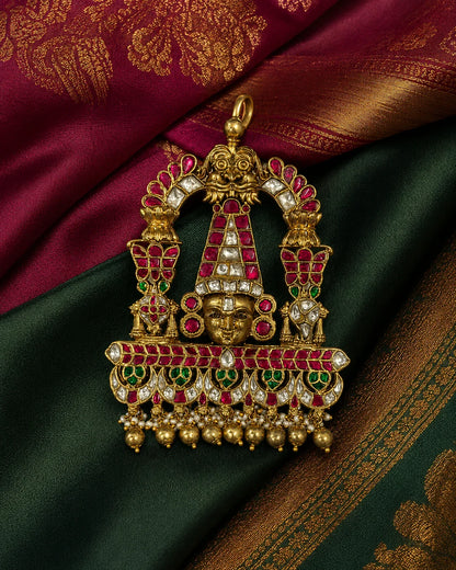 Tirupati Balaji Jadau Kundan temple pendant styled on green and magenta silk fabric