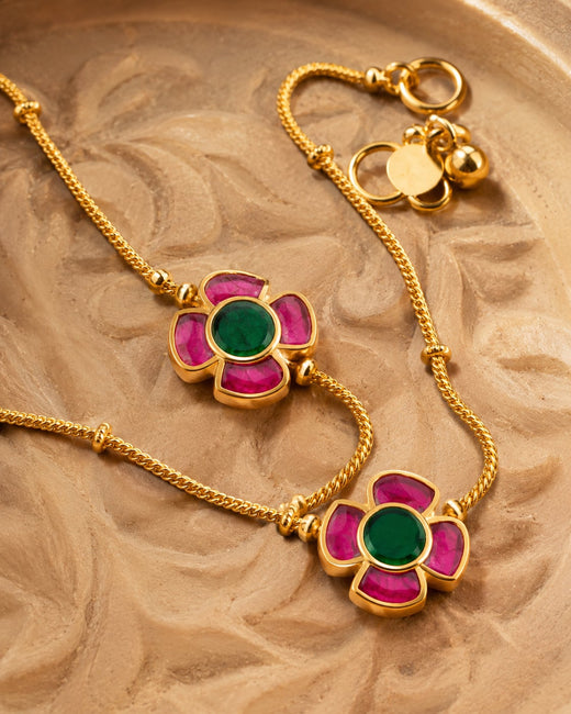 FeelOri twin chain floral jadau kundan payal anklets listed as a pair of anklets styled on foot with Indian occasion wear