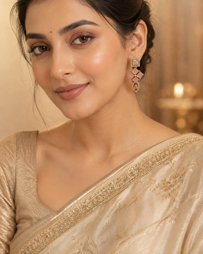 FeelOri white AD/CZ earrings styled with saree fabric for Indian occasion wear